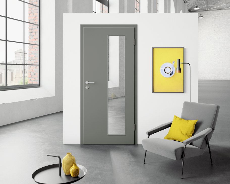 eine lavagraue Alba-Schallschutztür mit Lichtausschnitt LA GA-B an einer weißen Wand