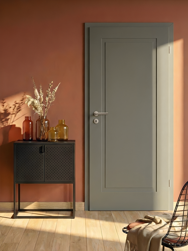 Lavagraue Cala-01-Stiltür an terracottafarbener Wand